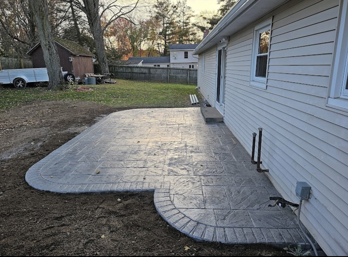 Stamped concrete patio at golden hour