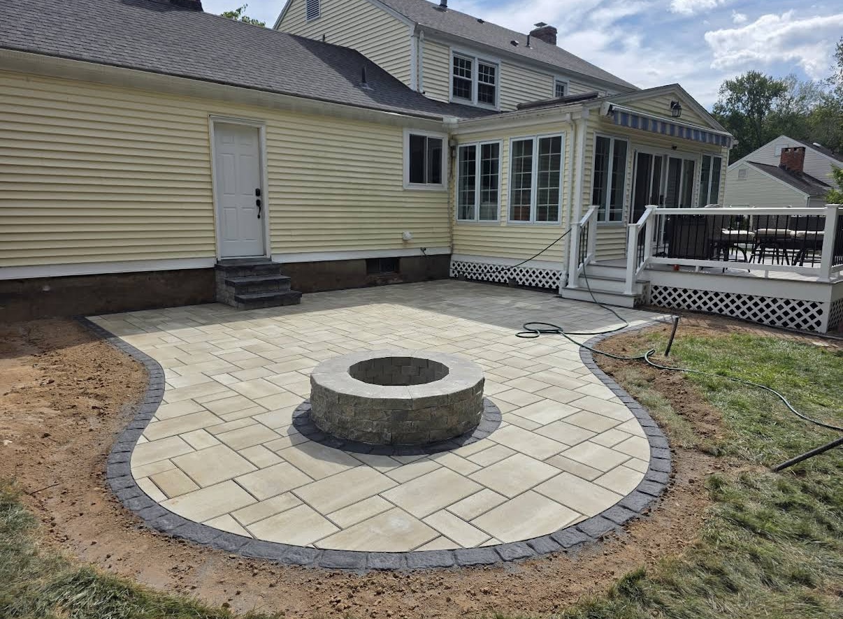 BTB Hardscaping paver patio with stone fire pit in Alfred, Maine